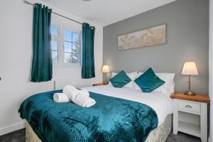 En eller flere senge i et værelse på CircleWay Homes - Colwick