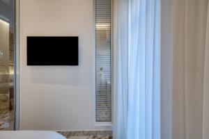 TV/trung tâm giải trí tại Nalia Suites