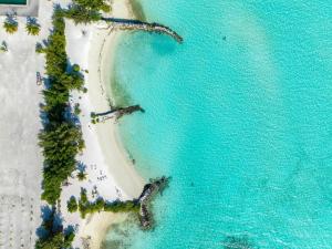 an overhead view of a beach and the ocean at Old Town Beach in Gaafaru