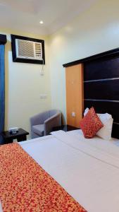 Giường trong phòng chung tại أرقي خيال للاجنحة الفندقية