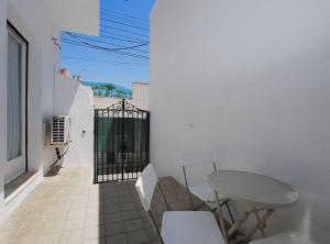 En balkon eller terrasse på La Platgeta · La Platgeta · Ideal family apartment, with private terrace