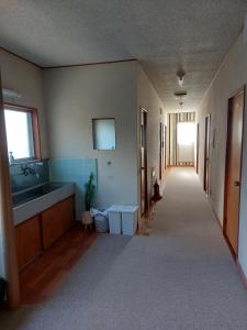 Koupelna v ubytování ゲストハウス凪季のやど