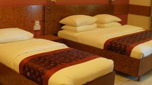 - 2 lits jumeaux dans une chambre d'hôtel dans l'établissement Hotel Summersands Al Wadi Al kabir, à Mascate 40 autres photos