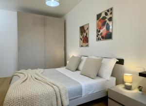 Postel nebo postele na pokoji v ubytování Residence Casa Palmira