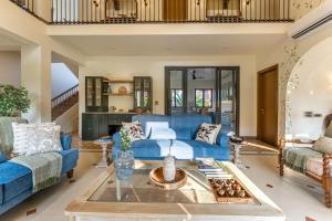 Χώρος καθιστικού στο ELIVAAS Casa Bonita 4BHK Hideaway with Private Pool