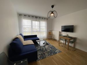 Et tv og/eller underholdning på BLUE By Dream Apartments