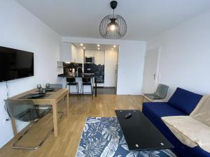 Et tv og/eller underholdning på BLUE By Dream Apartments