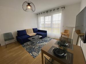 Et tv og/eller underholdning på BLUE By Dream Apartments