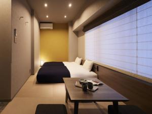 Minn Kiyomizu Gojo客房内的一张或多张床位