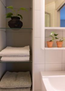 Koupelna v ubytování Unique apartment in midtown