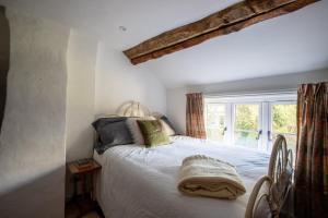 Postel nebo postele na pokoji v ubytování Characterful 5 Bedroom Country Retreat