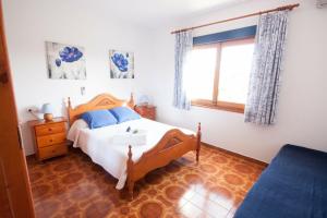 En eller flere senge i et værelse på Villa Puig den Valls 197 + 14 billeder