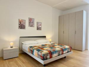 Postel nebo postele na pokoji v ubytování Residence Casa Palmira