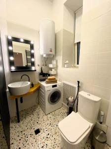 Et badeværelse på Kyiv Scandi Apartment