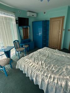 Postel nebo postele na pokoji v ubytování Albatros