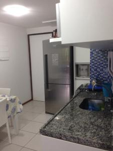 A cozinha ou cozinha compacta de Nannai Residence - Flat familiar