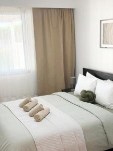 En eller flere senge i et værelse på Oceanfront Bliss - Atlantico residences