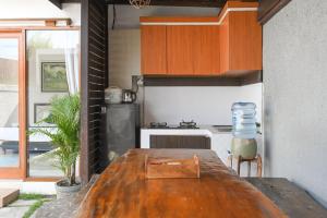 Køkken eller tekøkken på Hoki Villa by Urbanview Villa