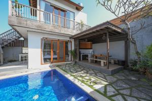 Swimmingpoolen hos eller tæt på Hoki Villa by Urbanview Villa