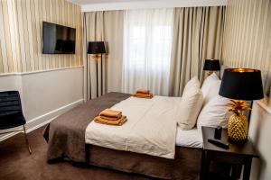 Voodi või voodid majutusasutuse Godstedlund toas