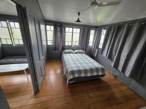 Giường trong phòng chung tại Cairns ,Buchan St Accommodation