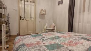 En eller flere senge i et værelse på Rózsamorzsa Vendégház Szerencs