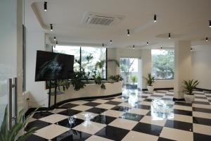 TV a/nebo společenská místnost v ubytování Lux Living Hotel