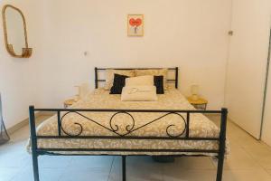 Giường trong phòng chung tại Super appartement avec piscine