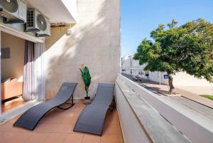 En balkon eller terrasse på 1H Apt Narciso