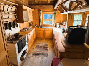 Kuchyň nebo kuchyňský kout v ubytování Chalet Wirtsalm + 13 fotografií