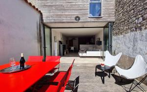 Et opholdsområde på Agréable villa au calme dans centre village