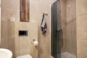 a bathroom with a shower with a glass door at Willa Diament in Kudowa-Zdrój +81 photos