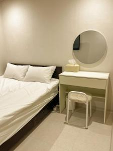 Giường trong phòng chung tại STAYV 스테이브 장안 - cozy room in 답십리 동대문 +7 ảnh