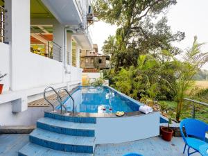 Bazén v ubytování Palette The Moon Hotel by CheckIn Goa nebo v jeho okolí