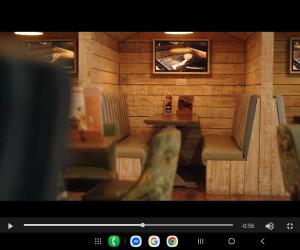 een foto van een restaurant met een tafel en stoelen bij Sam's Caravan Hire Coastfield Holiday Village Ingoldmells in Ingoldmells