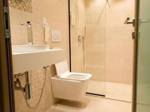 Koupelna v ubytování City Center Urban Artist + 7 fotografií