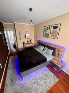 En eller flere senge i et værelse på N3 Apartment