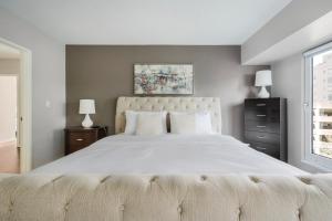 En eller flere senge i et værelse på Blueground Pike Place Market pool nr Waterfront SEA-979 + 31 billeder