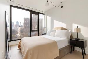 Postel nebo postele na pokoji v ubytování Blueground Downtown Brooklyn fitness center nr Brooklyn Bridge NYC-2187