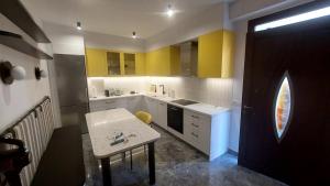 Kuchyň nebo kuchyňský kout v ubytování The Hummingbirds + 14 fotografií