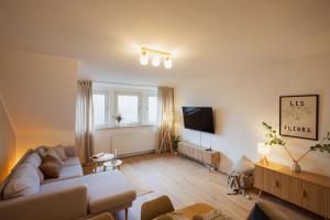 TV a/nebo společenská místnost v ubytování HYGGE HOMES - Apartment 'Lilla Lycka'