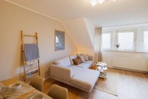 Posezení v ubytování HYGGE HOMES - Apartment 'Lilla Lycka'