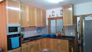 Una cocina o cocineta en Get house kira 27 fotos más