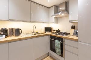 Nhà bếp/bếp nhỏ tại The Regent Luxury Pad