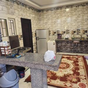 Η κουζίνα ή μικρή κουζίνα στο Full villa, not a house, with a swimming pool, 4 luxurious bedrooms