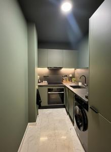 Kuchyň nebo kuchyňský kout v ubytování New Architect & Design Studio - CFC & Maarif