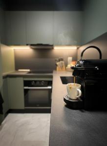 Kuchyň nebo kuchyňský kout v ubytování New Architect & Design Studio - CFC & Maarif