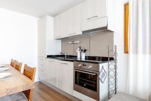 Kuchyň nebo kuchyňský kout v ubytování Schwabhorn + 10 fotografií