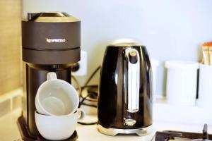 Příslušenství pro přípravu čaje a kávy v ubytování Contemporary Comfort