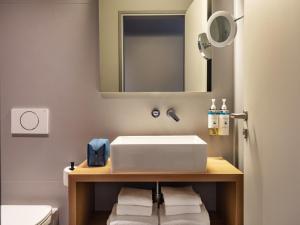 Et badeværelse på Numa Berlin Kudamm